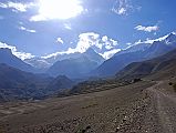 302 Looking Towards Jharkot With Yakgawa Kang, Thorung La, Thorong Peak, Khatung Kang Yakgawa Kang ( 6481m), Thorung La, Thorong Peak (6144m) and Khatung Kang (6484m) along with some unnamed peaks shone on the horizon from the trail between Kagbeni to Jharkot.